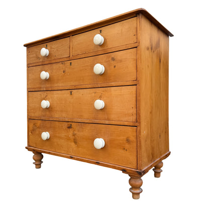 Victorian pine chest of drawers with white ceramic knobs two short over three long drawers