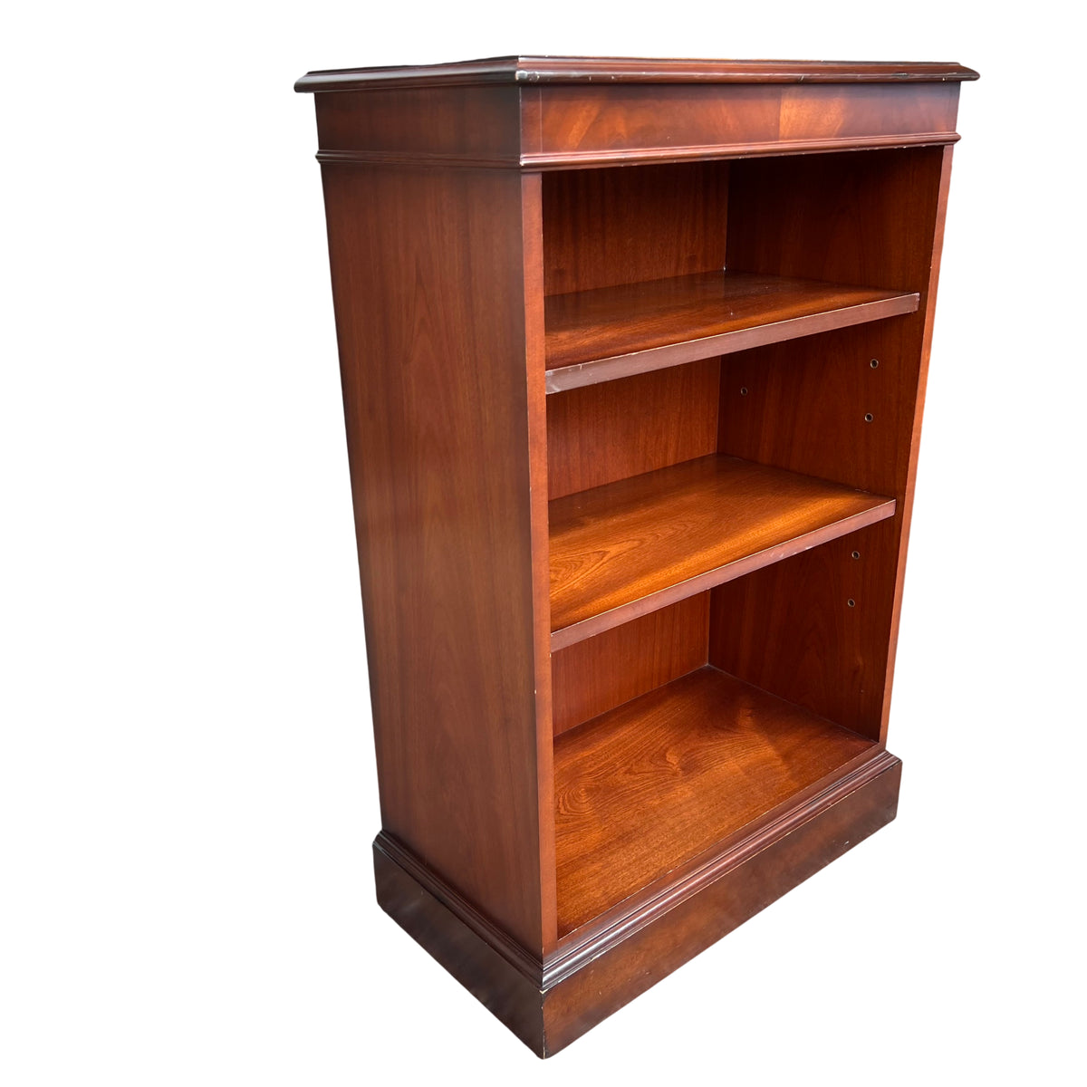 Vintage Brights of Nettlebed mahogany bookcase with moulded top and plinth base