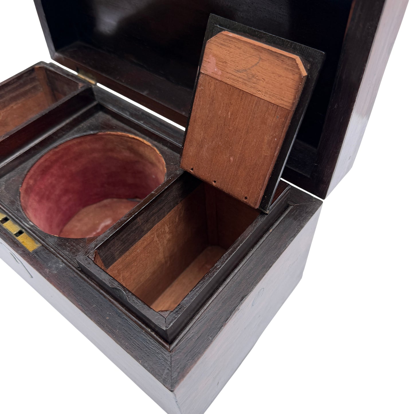 Open Victorian rosewood tea caddy showing fitted compartments and velvet liner