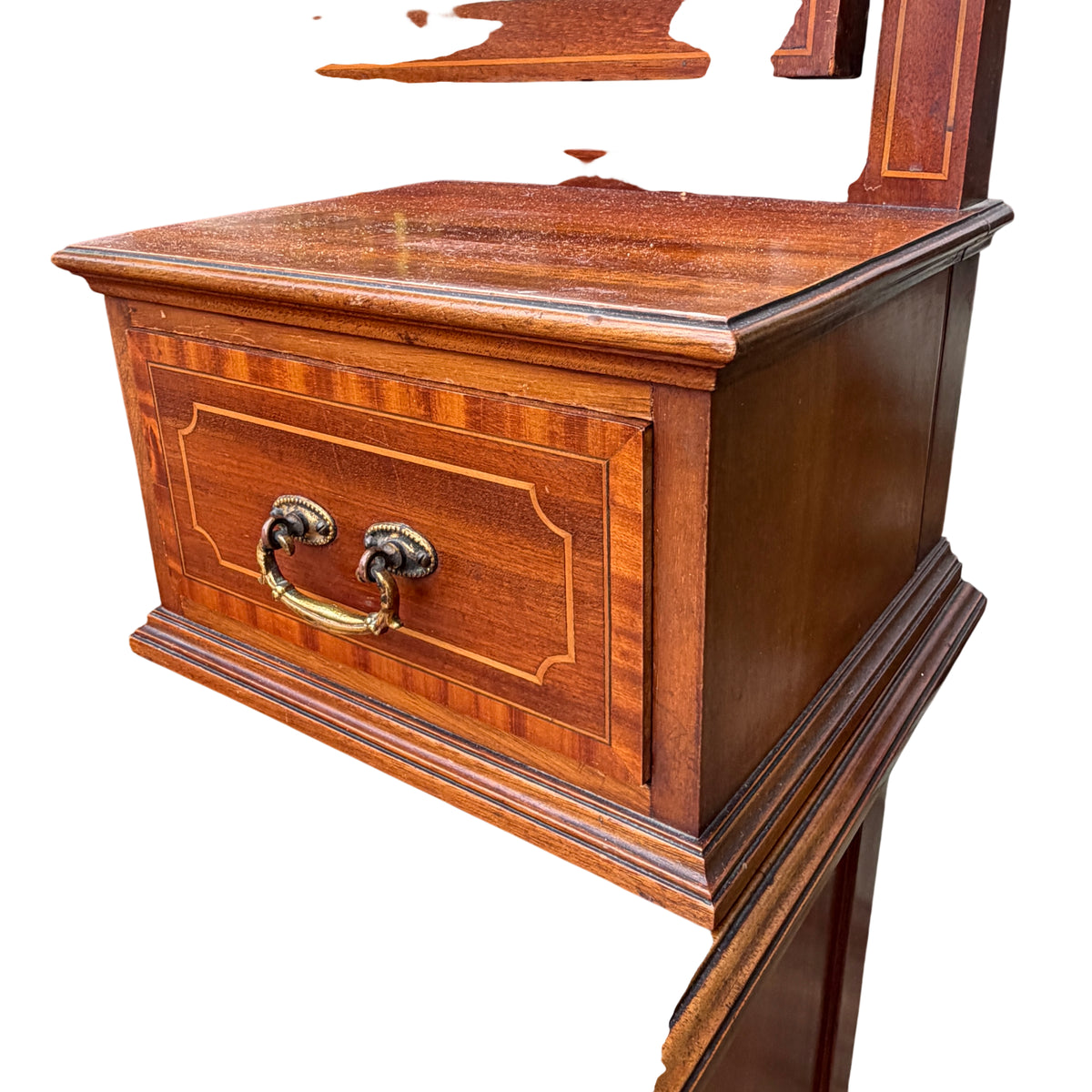 Upper drawers and inlay detail on vintage mahogany dressing chest
