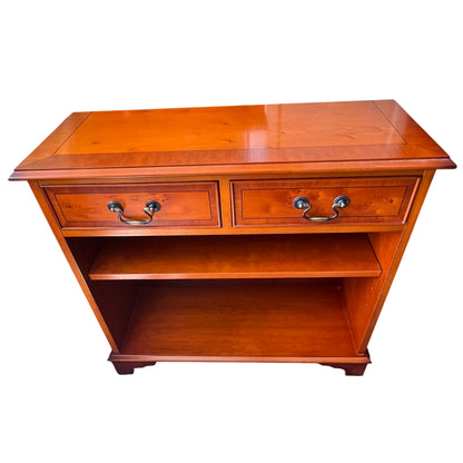Front view small wooden bookcase with two shallow drawers and shelf
