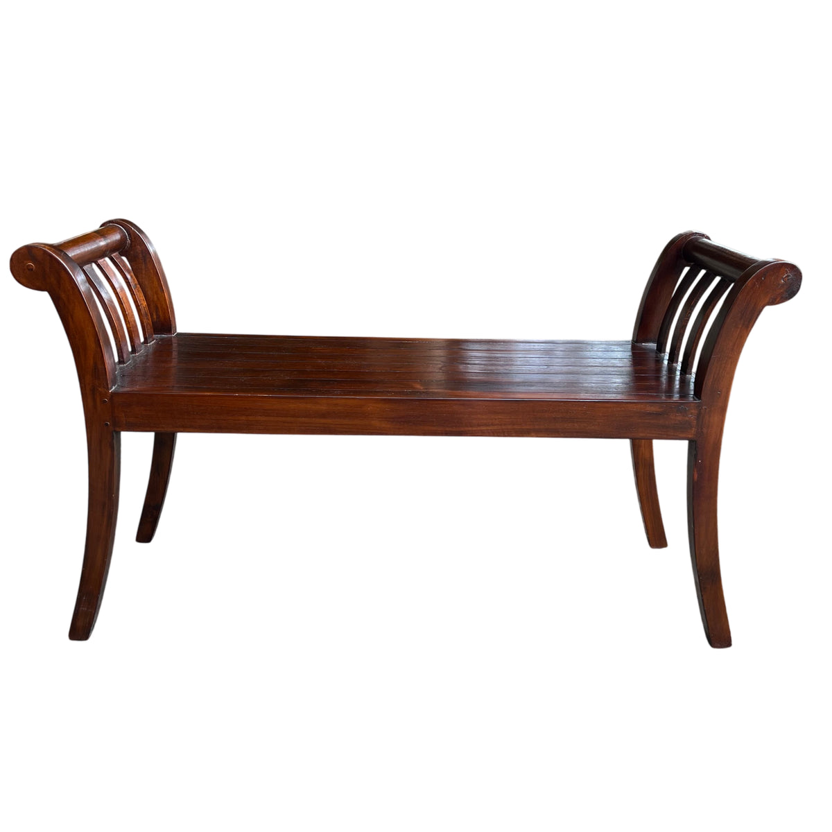 Side-on view of Lombok teak hall bench showing curved leg and scroll arm detail