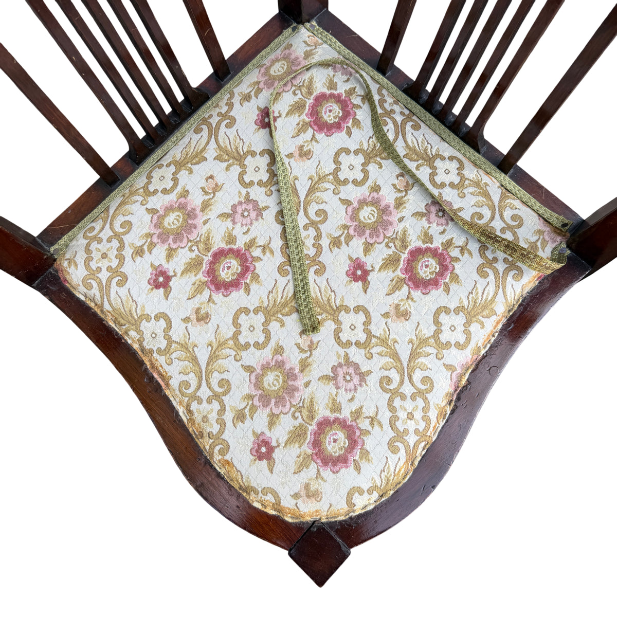 Floral upholstered seat on small Edwardian corner chair with loose edging