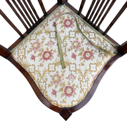 Floral upholstered seat on small Edwardian corner chair with loose edging