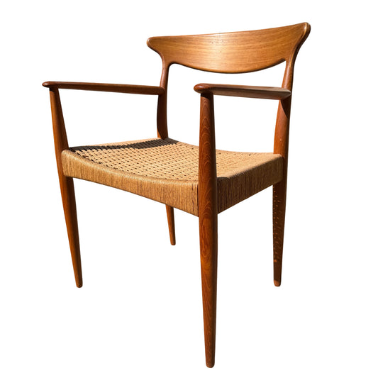 Danish mid-century teak dining armchair with woven paper-cord seat and curved backrest