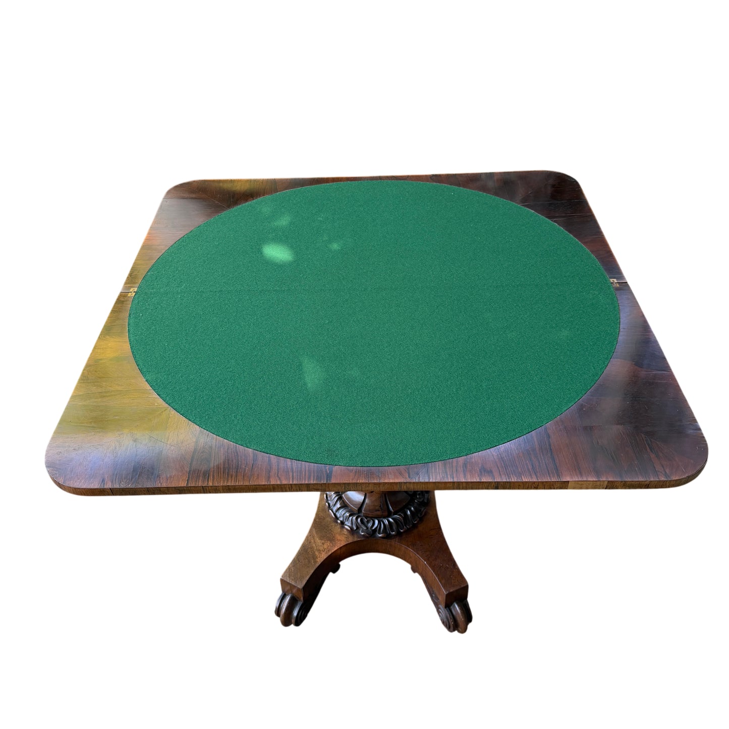 Close-up of figured rosewood veneer and edge of tilt-top card table