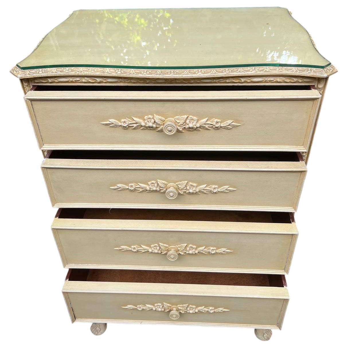 Tall four-drawer painted chest of drawers with raised floral carving