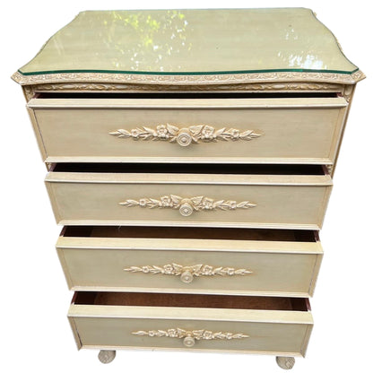 Tall four-drawer painted chest of drawers with raised floral carving