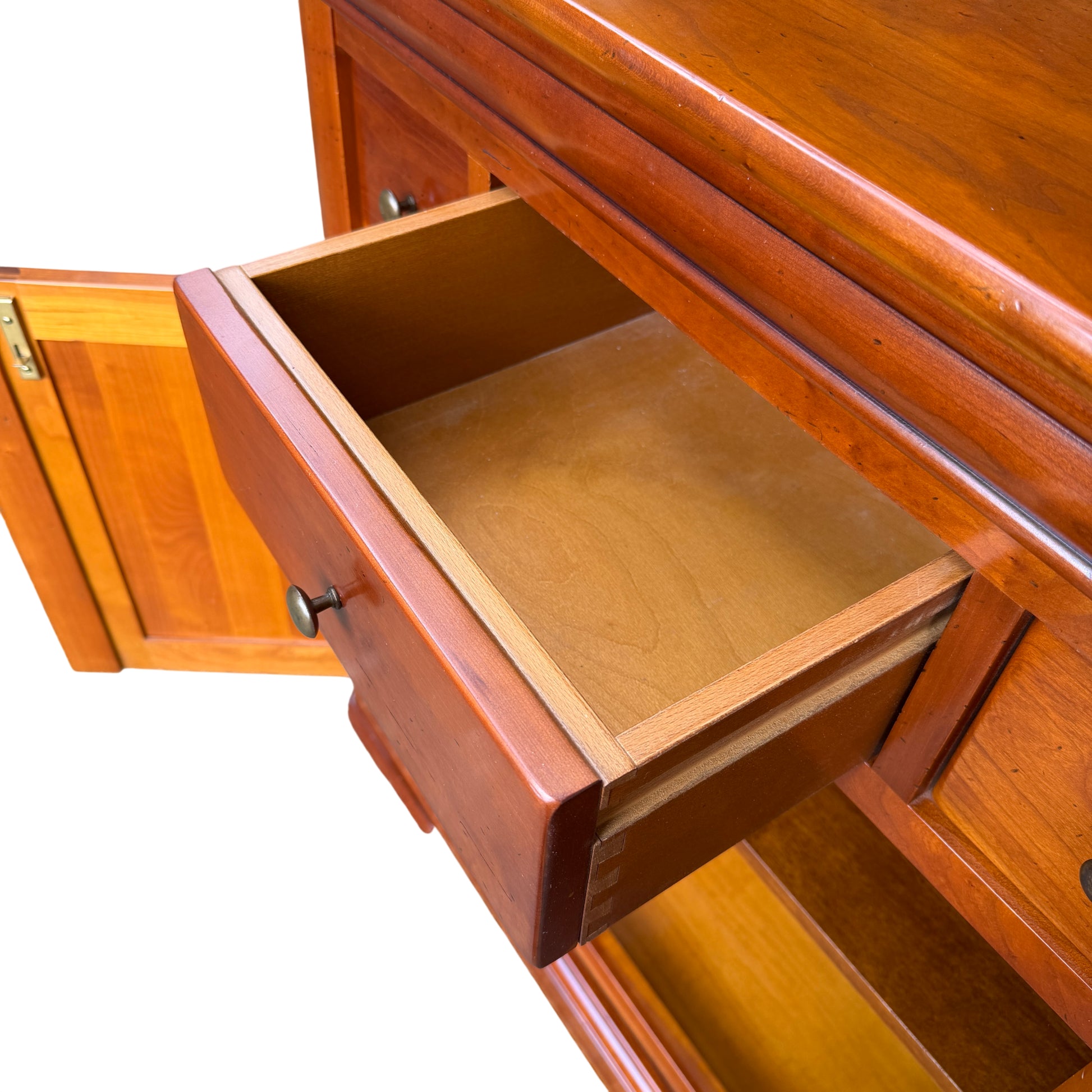 Close-up of drawer front showing small dents and surface marks