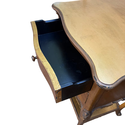 Pair of contemporary bedside cabinets photographed against a vehicle wheel