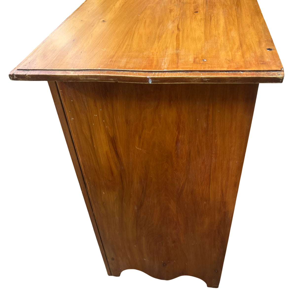 Open upper drawer interior of pine chest showing timber runners