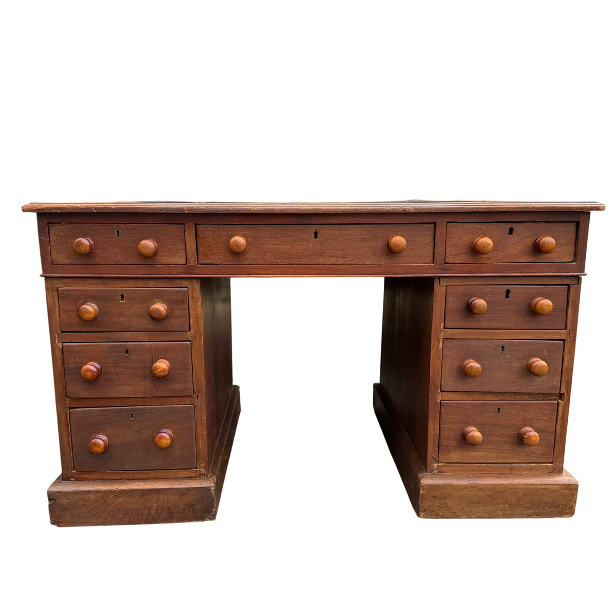 Front view mahogany pedestal desk with turned wooden knobs and plinth bases