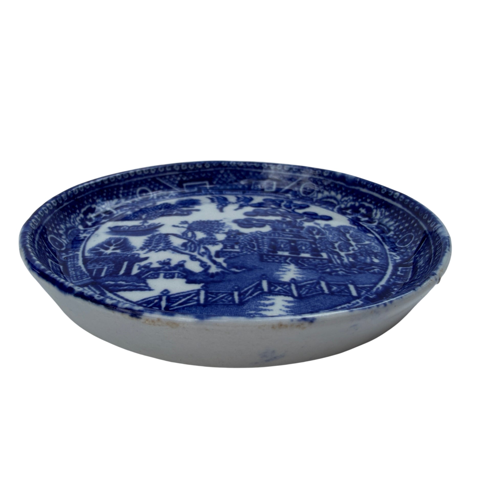 Small Willow pattern transferware butter pat with pagoda and bridge motif