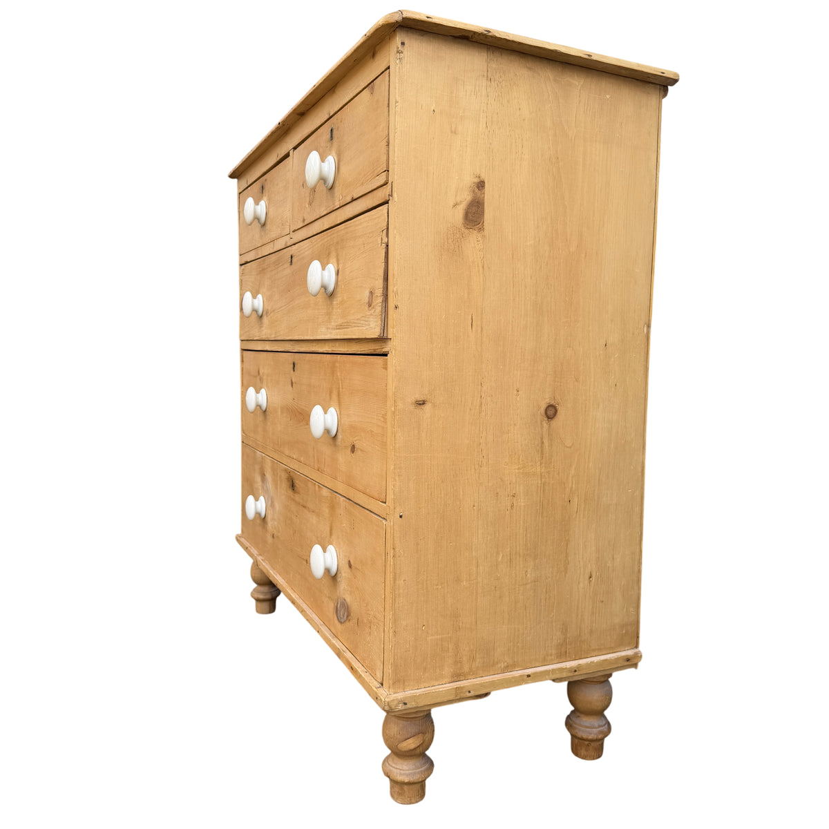 Side view of Victorian pine tallboy showing simple construction and finish