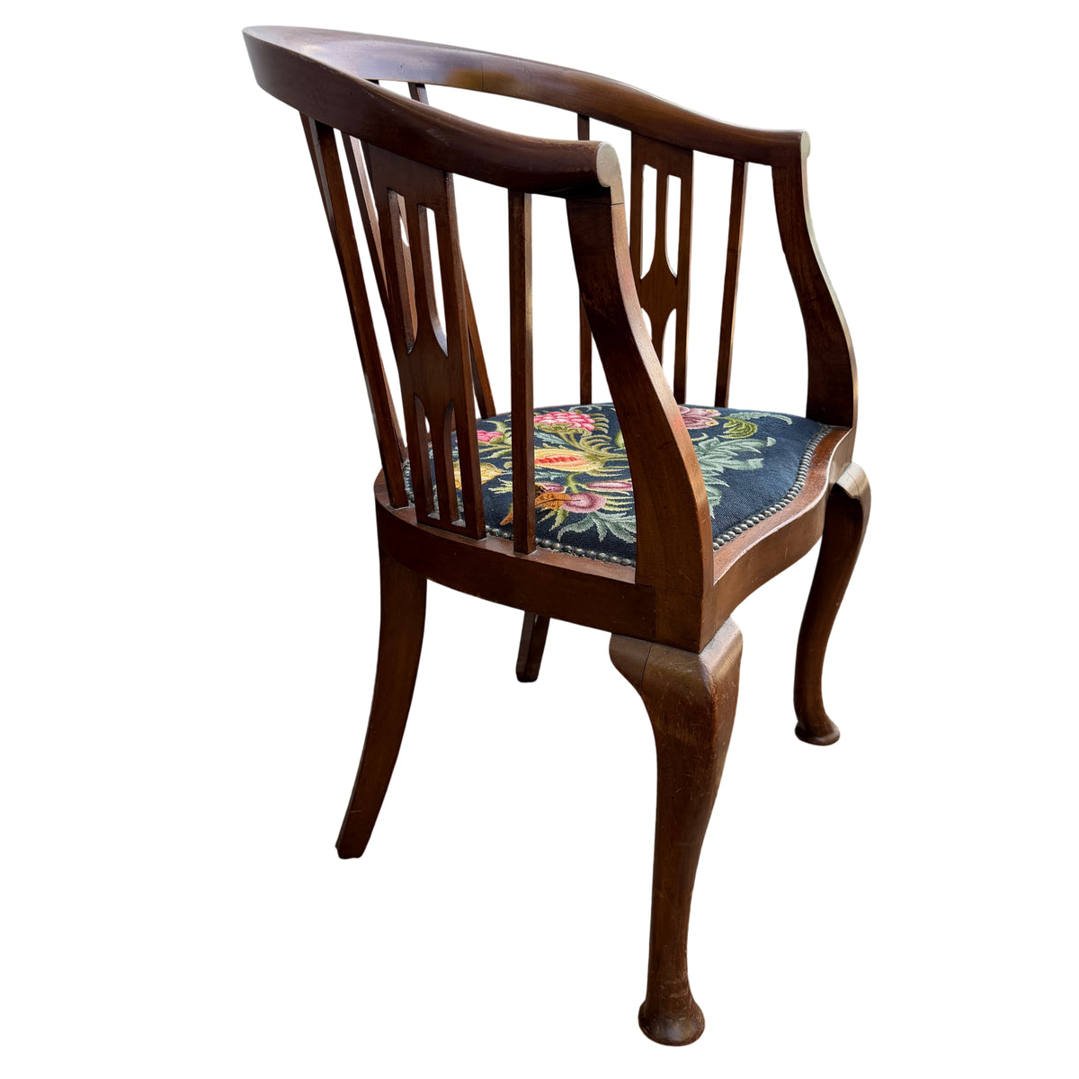 Curved top rail with visible join line on stained wood Arts & Crafts armchair