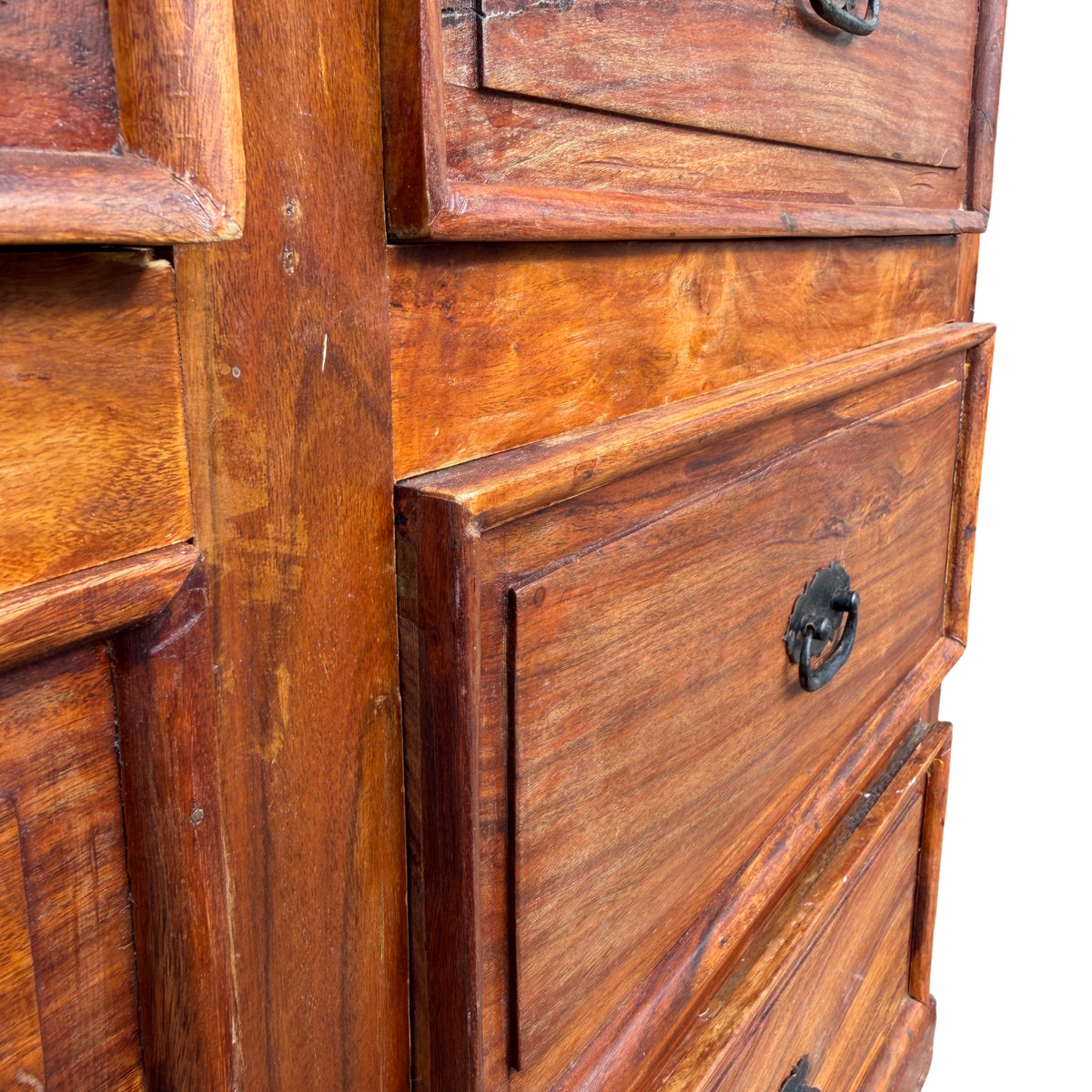 Upper section of a wooden chest of drawers with moulded cornice and iron handles