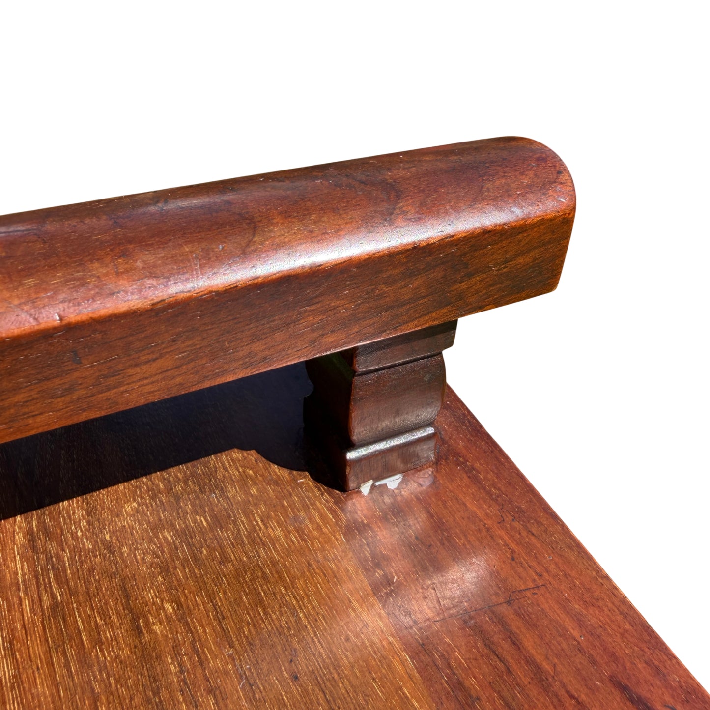Full-height view of compact mahogany console table on a lawn background