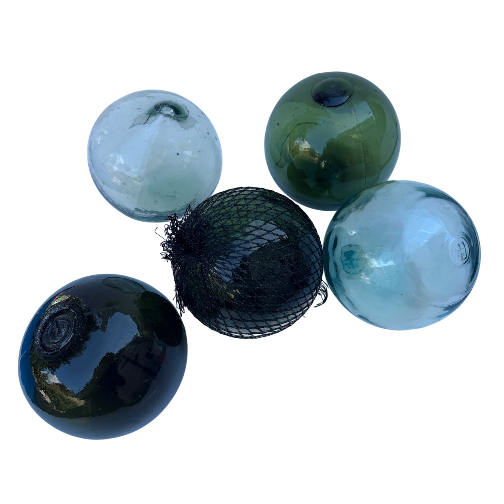Vintage hand-blown glass float in pale aqua with pontil mark and surface bubbles