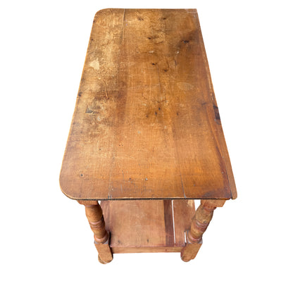 Close-up of turned leg and joint of vintage pine hall table