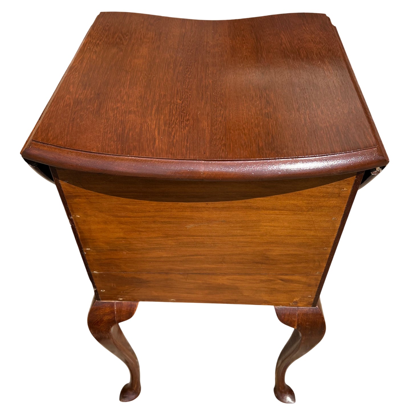 Open drawers on vintage bedside cabinet revealing interior timber