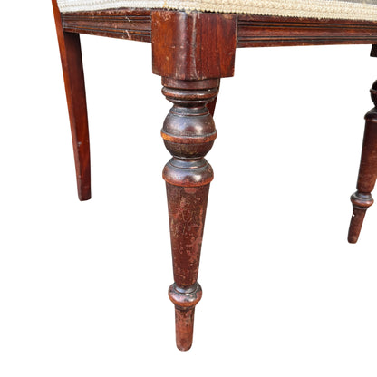 Close detail of seat rail join and finish on antique mahogany chair