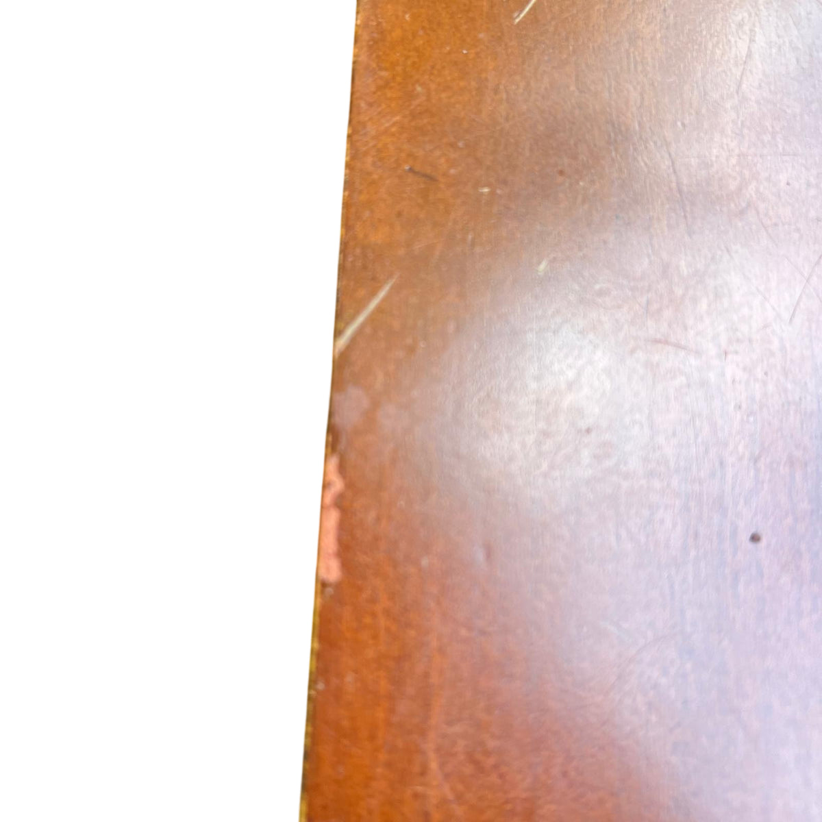 Under-shelf and leg detail of vintage coffee table with brown finish