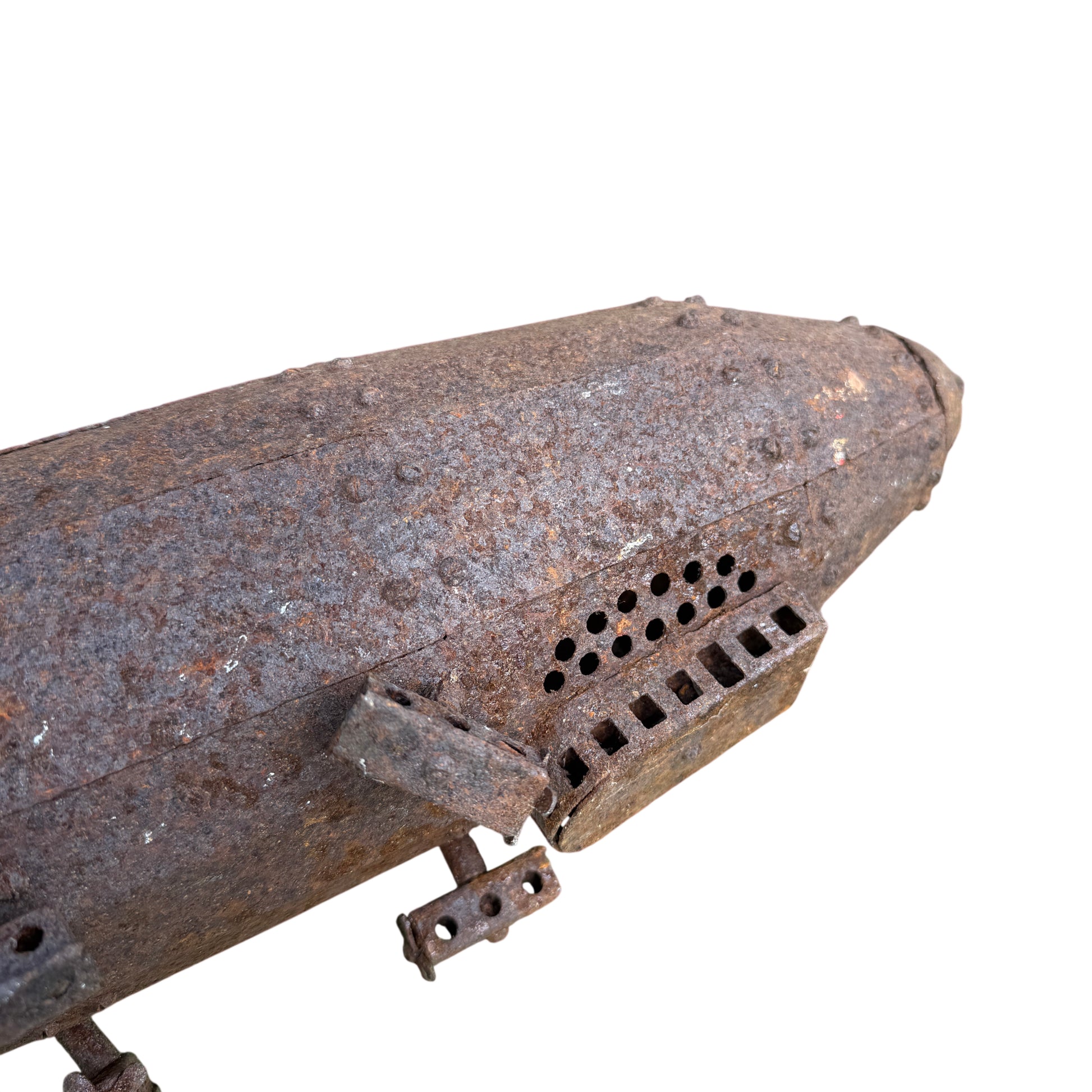 Riveted pressed-steel hull of vintage Zeppelin model showing rivet rows and curved panels