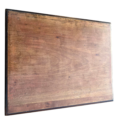 Overhead image of middle nesting table top with scratches and finish wear