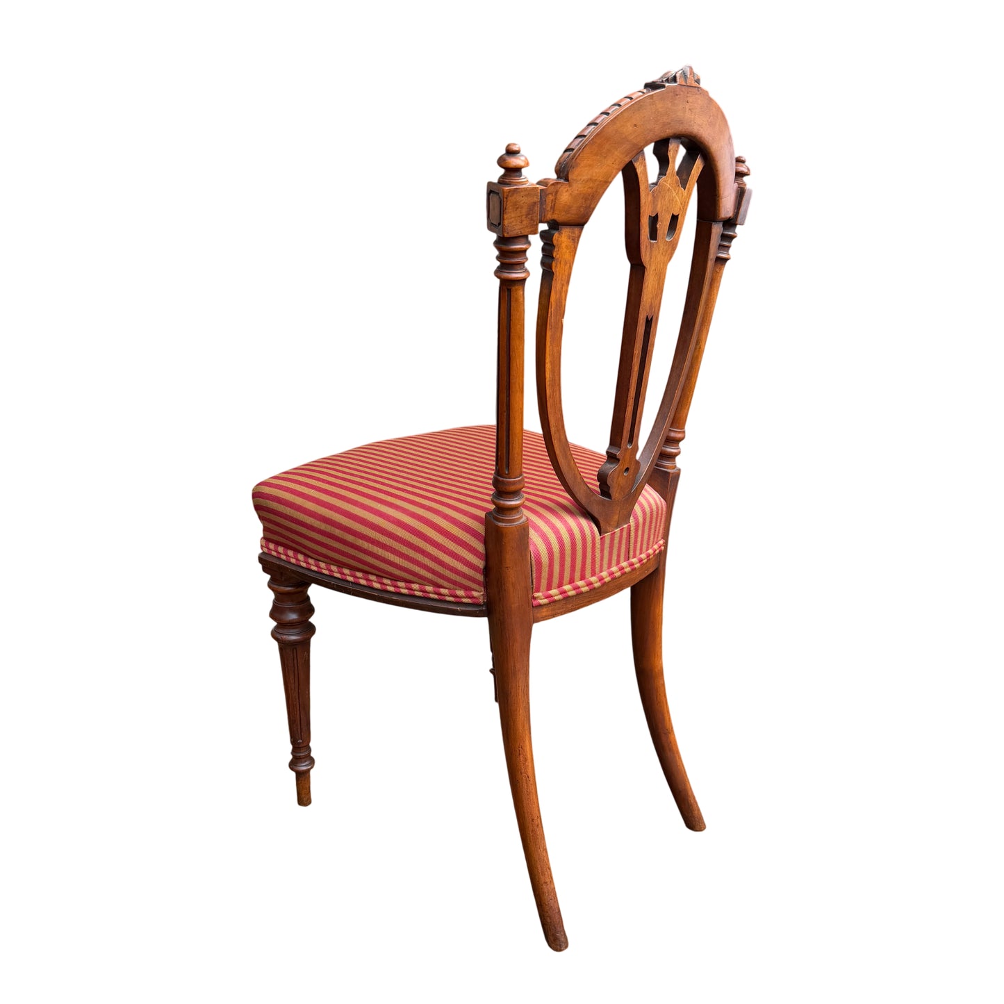 Close-up of carved crest and rope moulding detail on a Victorian chair back