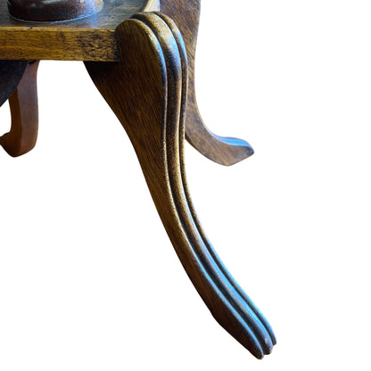 Edge close-up showing small chips and finish wear on galleried rim