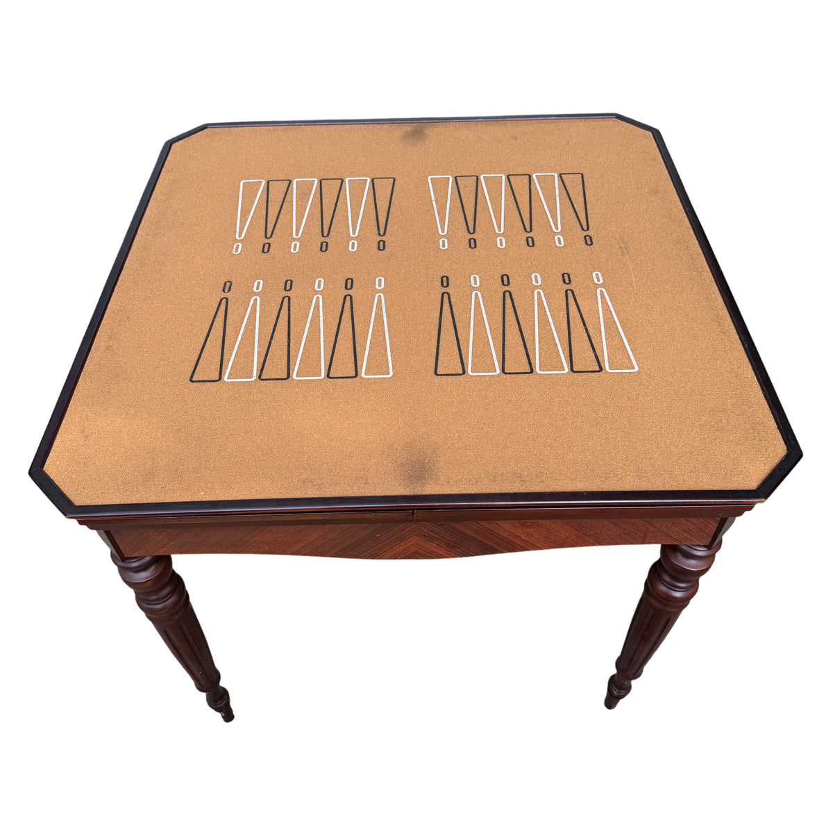 Detail of turned leg and fluted carving on vintage games table