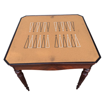 Detail of turned leg and fluted carving on vintage games table
