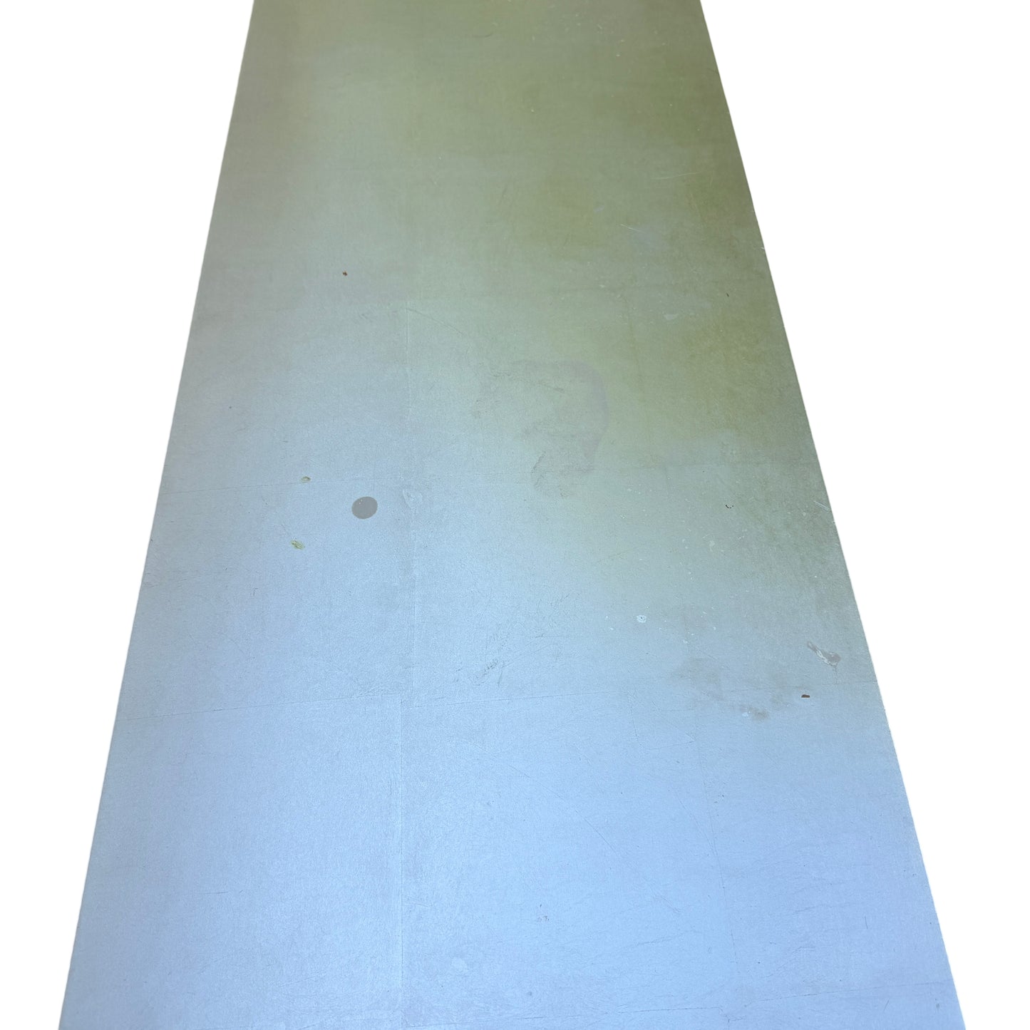 Close-up of top edge and lower edge paint loss on silver painted console table