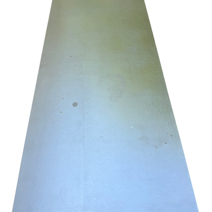 Close-up of top edge and lower edge paint loss on silver painted console table