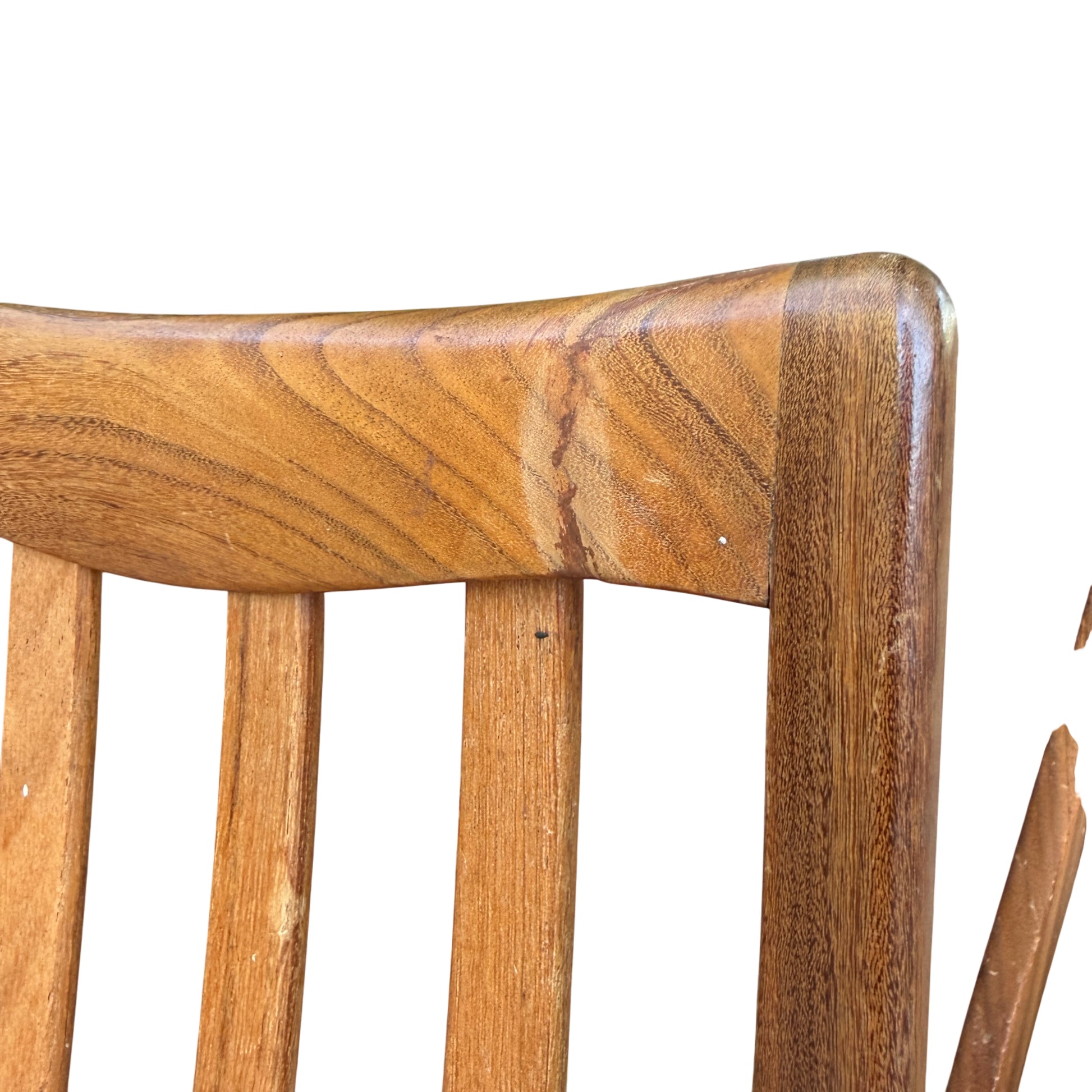 Detail of slatted back and grain of the wood on a retro dining chair