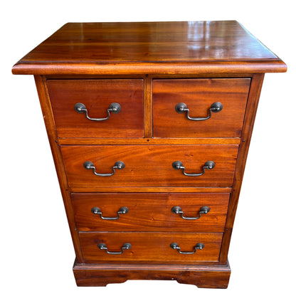 Narrow stained hardwood chest of drawers tallboy with metal drop handles front view