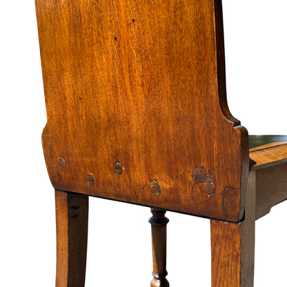 Close-up of seat edge showing slight splintering and previous repair evidence