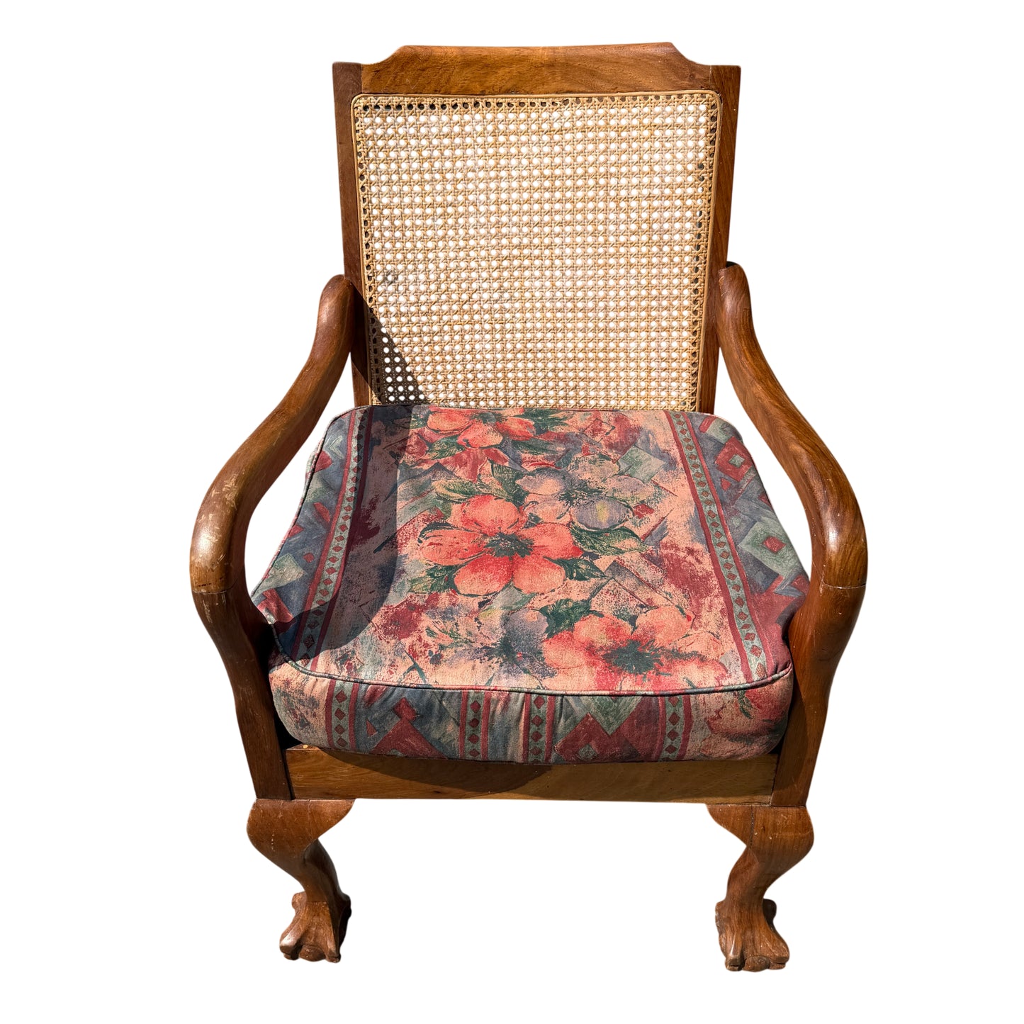 Close-up of caned back panel and wooden top rail on armchair