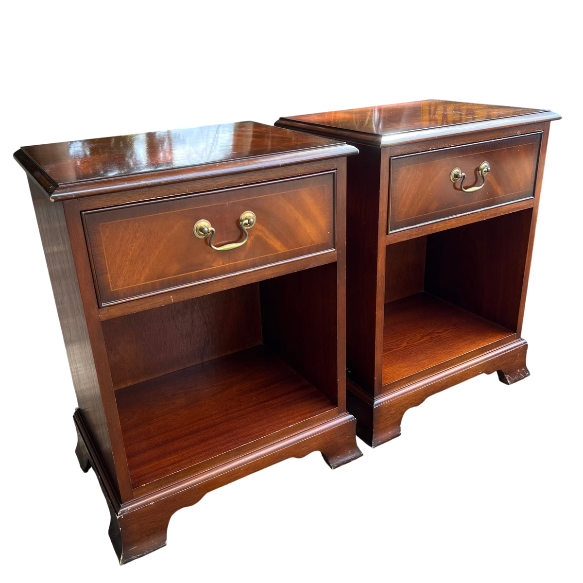 Pair of Brights of Nettlebed mahogany bedside cabinets with brass drop handles