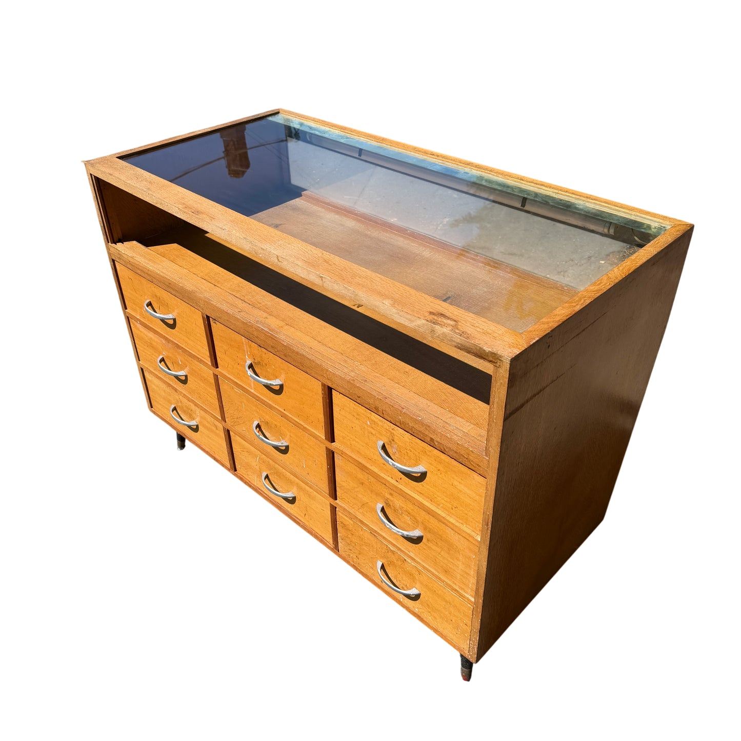 Mid Century oak veneer display cabinet with twelve small drawers and metal handles