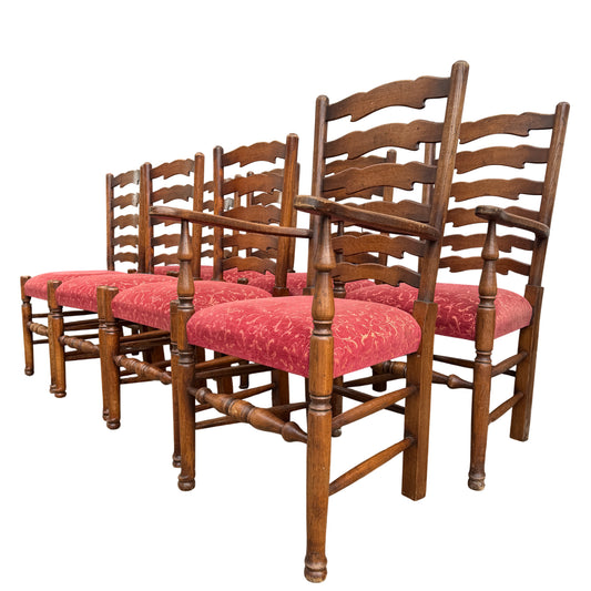 Vintage oak ladderback dining chairs with red upholstered seats shown outdoors against a white van