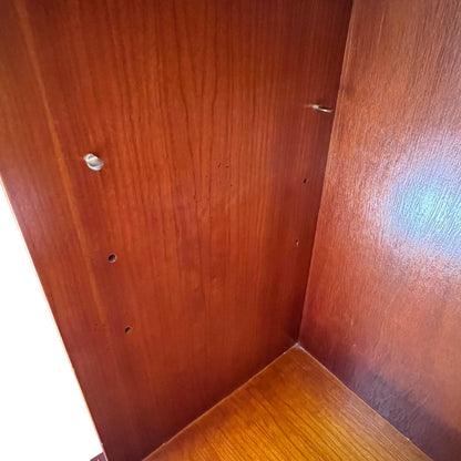 Side view showing the clean lines and panelled construction of the bookcase