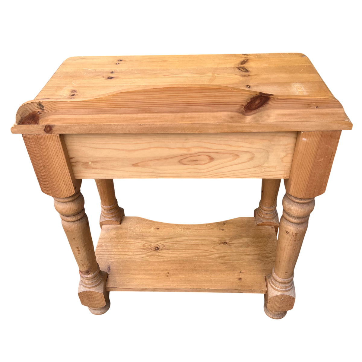 Close-up of drawer front and knob on pine hall table