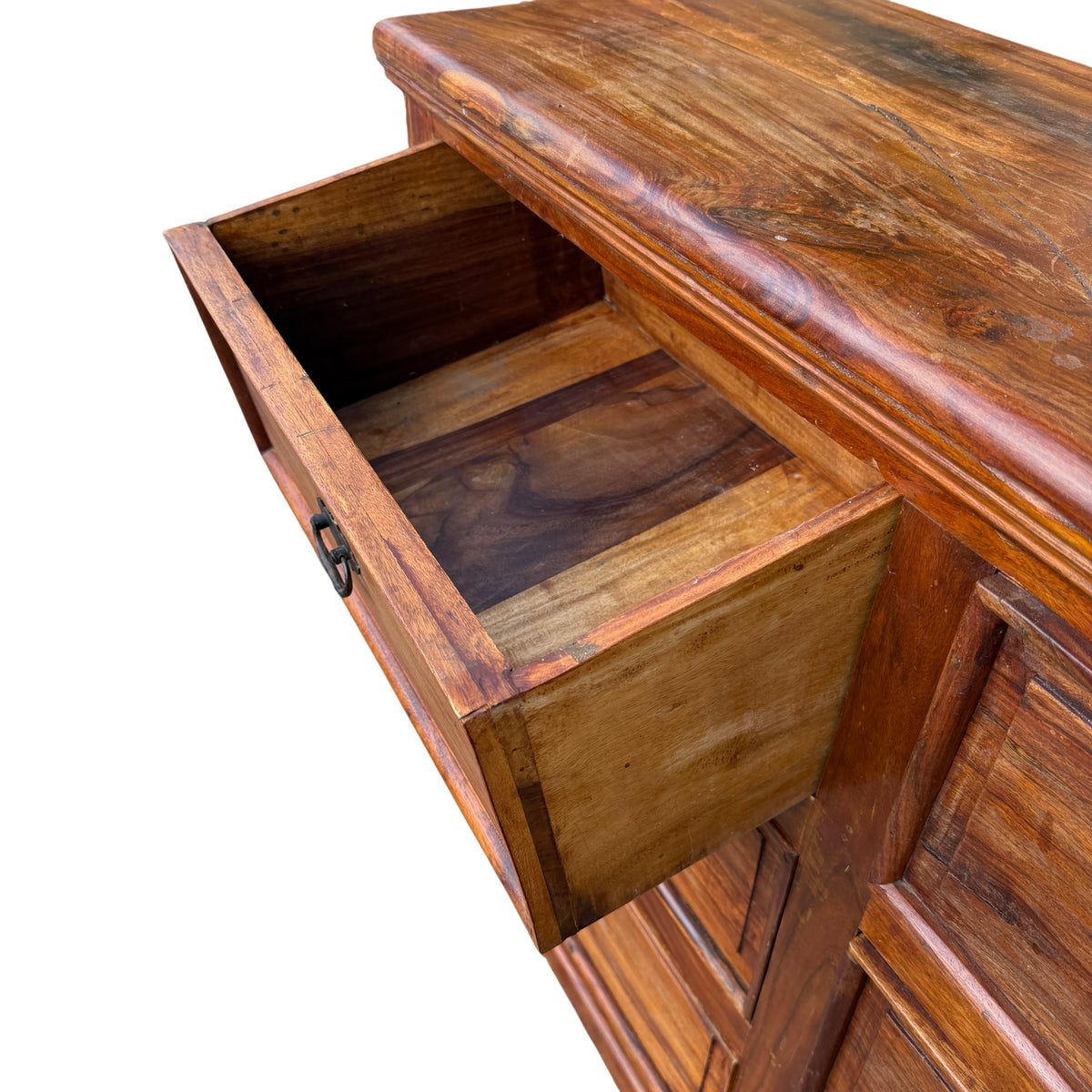 Close-up of drawer fronts showing natural wood grain and finish variations