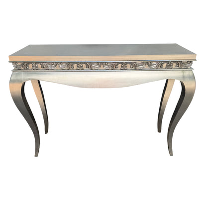 Silver painted console table with ornate carved frieze and narrow footprint for hallway