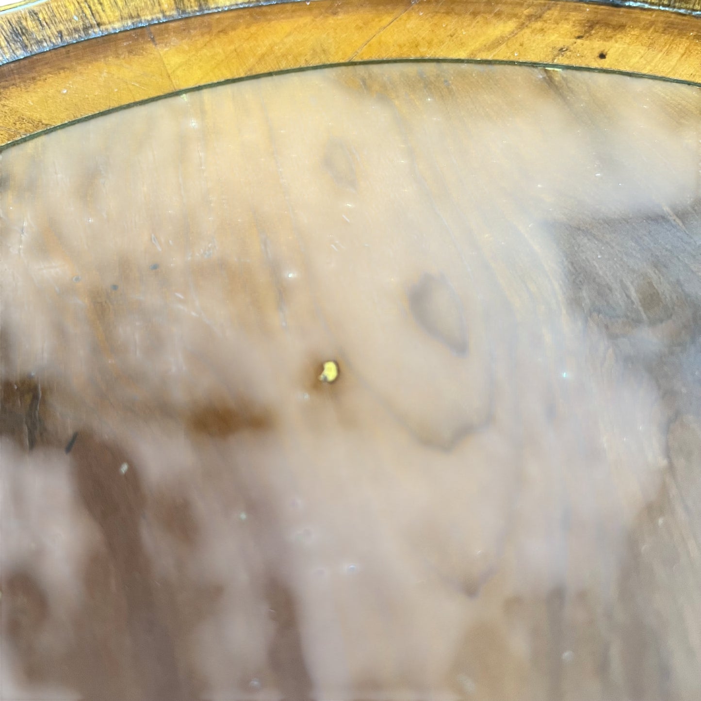 Wood grain and patina on a Victorian walnut small side table top