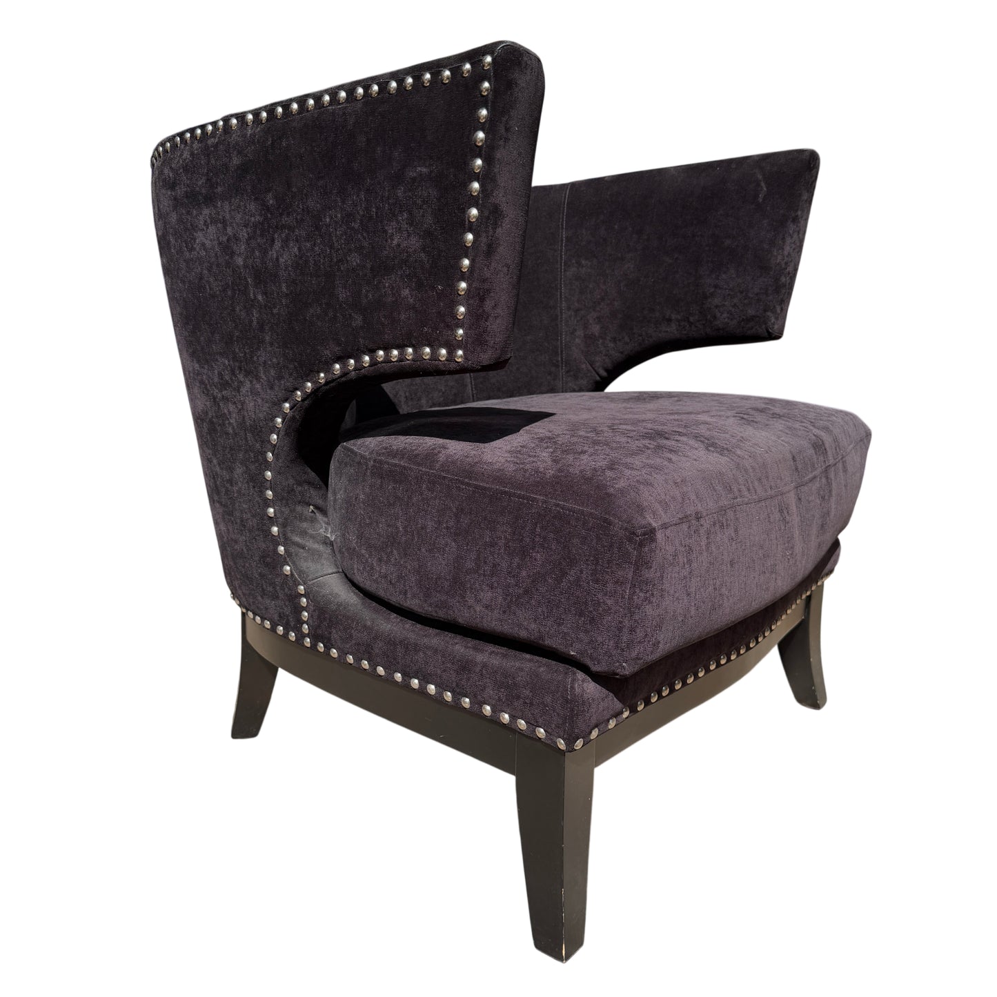 Side view black wingback chair with nickel stud trim and dark velvet-effect fabric