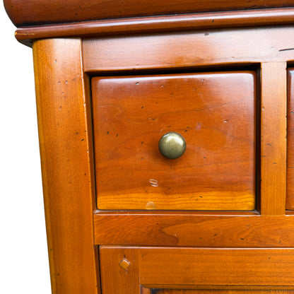 Detail of working lock and key on French reproduction wooden cupboard
