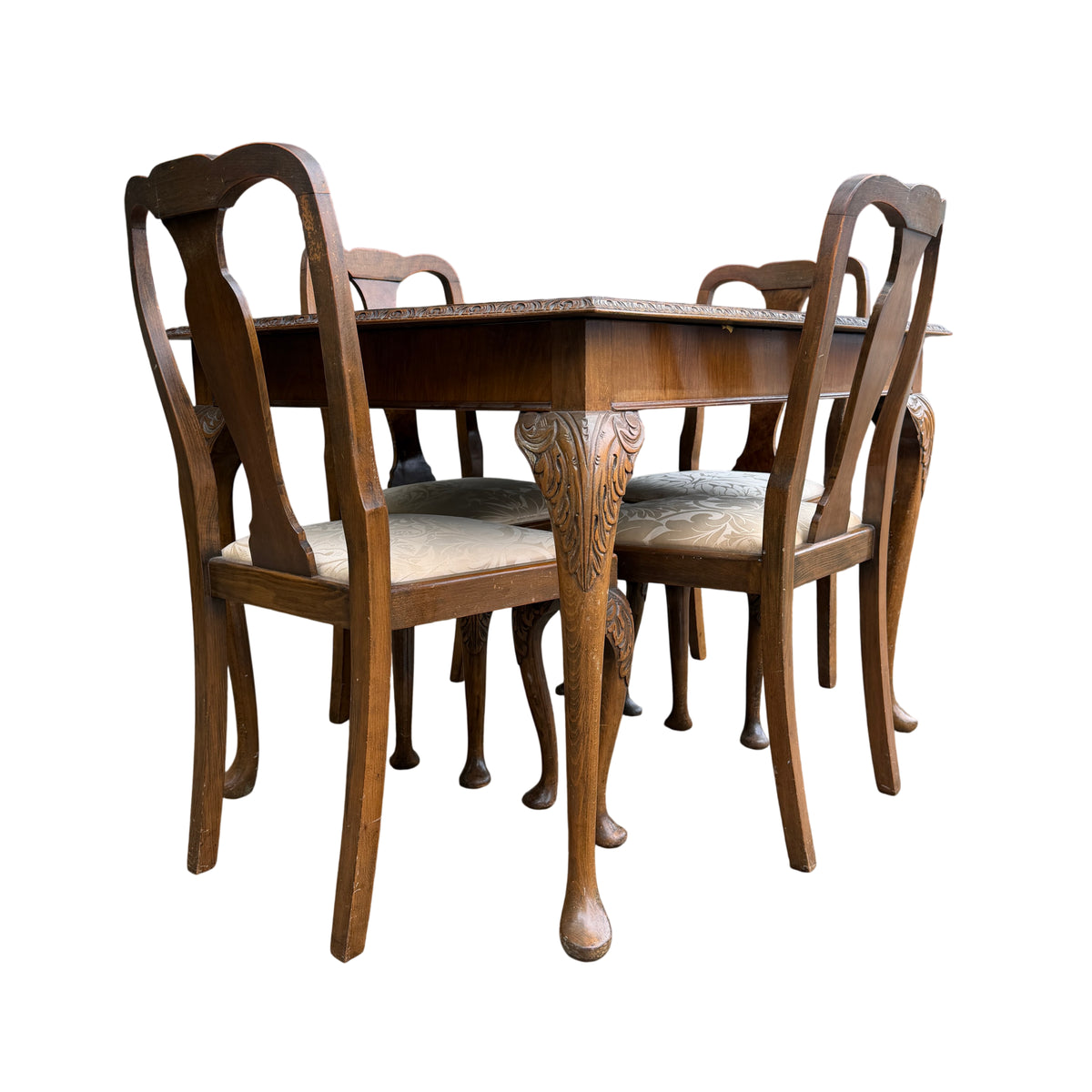 Close-up of carved apron and edge moulding on walnut extending dining table
