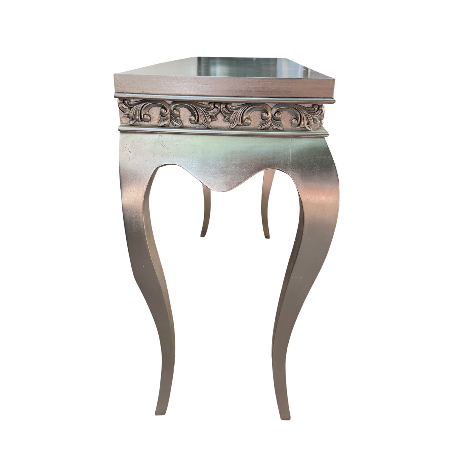 Painted wood console table with metallic silver finish and ornate carved trim